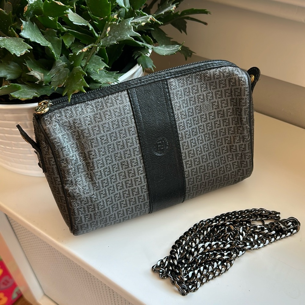 Authentic FENDI clutch with added chrome unbranded chain.